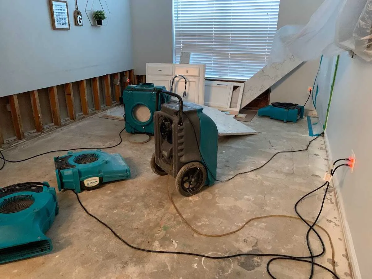 Dehumidifier in flood-cut room for Water Damage Restoration in Palmyra